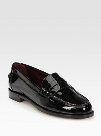 Glossy patent leather shapes this timeless wardrobe staple. Patent leather upperLeather lining and solePadded insoleMade in Italy Glossy patent leather shapes this timeless wardrobe staple. Patent leather upperLeather lining and solePadded insoleMade in Italy
