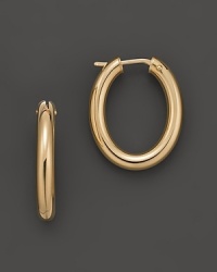 Classic oval hoop earrings in yellow gold. Designed by Roberto Coin. Classic oval hoop earrings in yellow gold. Designed by Roberto Coin.