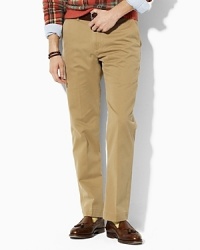 A classic-fitting, sophisticated pant is tailored with a relaxed straight leg, flat front and classic rise in sleek stonewashed cotton chino for refined texture. A classic-fitting, sophisticated pant is tailored with a relaxed straight leg, flat front and classic rise in sleek stonewashed cotton chino for refined texture.
