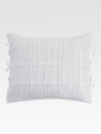 Make your bed especially inviting with this feather-filled, pure white pillow soften with shirring and side ties.16 X 20Feather fillingCottonMachine wash coverImported Make your bed especially inviting with this feather-filled, pure white pillow soften with shirring and side ties.16 X 20Feather fillingCottonMachine wash coverImported