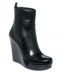Elevate your style with the glamourous Emory platform wedges by MICHAEL Michael Kors. A towering heel and polished upper adds edge to your already-fabulous outfit. Elevate your style with the glamourous Emory platform wedges by MICHAEL Michael Kors. A towering heel and polished upper adds edge to your already-fabulous outfit.