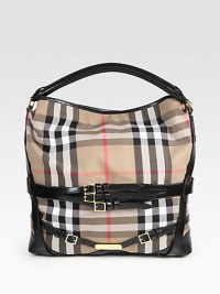 A perfect slouchy shape for all of your essential items, crafted in the classic canvas Burberry check with sleek leather trim. Leather top handle, 3 dropDetachable leather shoulder strap, 9½ dropOne inside zip compartmentOne inside zip pocketCotton lining10W X 12H X 5DMade in Italy