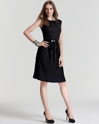Pleats ruled spring runways and this Jones New York Collection dress makes the most of the trend. A flouncy pleated skirt meets a fitted bodice for easy elegance. Pleats ruled spring runways and this Jones New York Collection dress makes the most of the trend. A flouncy pleated skirt meets a fitted bodice for easy elegance.