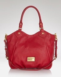 MARC BY MARC JACOBS's signature leather tote is endlessly versatile and oh so right, day or night. MARC BY MARC JACOBS's signature leather tote is endlessly versatile and oh so right, day or night.