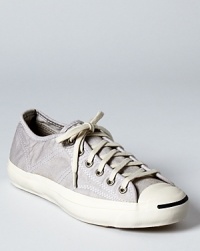 In canvas twill, this casual take on Converse by Jack Purcell's Helen sneaker offers lighthearted, comfortable style. In canvas twill, this casual take on Converse by Jack Purcell's Helen sneaker offers lighthearted, comfortable style.
