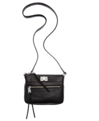 Simplistically chic with just enough shine. This luxurious leather crossbody from Calvin Klein gives you on-the-go style with glistening hardware and conveniently placed pockets. Simplistically chic with just enough shine. This luxurious leather crossbody from Calvin Klein gives you on-the-go style with glistening hardware and conveniently placed pockets.