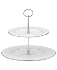 With the delicate pattern and platinum bands of Venetian Lace dinnerware, this two-tiered server presents petits fours, tea sandwiches and more with timeless elegance. Featuring a silvertone metal handle and the fine bone china of Lenox. With the delicate pattern and platinum bands of Venetian Lace dinnerware, this two-tiered server presents petits fours, tea sandwiches and more with timeless elegance. Featuring a silvertone metal handle and the fine bone china of Lenox.