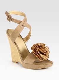 Adjustable, soft nubuck leather straps and an artful flower adornment add ladylike vibes to this timeless straw wedge. Straw wedge, 4 (100mm)Covered platform, ½ (15mm)Compares to a 3½ heel (90mm)Suede and straw upperLeather lining and solePadded insoleMade in SpainOUR FIT MODEL RECOMMENDS ordering true size. Adjustable, soft nubuck leather straps and an artful flower adornment add ladylike vibes to this timeless straw wedge. Straw wedge, 4 (100mm)Covered platform, ½ (15mm)Compares to a 3½ heel (90mm)Suede and straw upperLeather lining and solePadded insoleMade in SpainOUR FIT MODEL RECOMMENDS ordering true size.