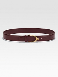 A smooth calfskin style embellished with shiny brass hardware. Calfskin with shiny brass hardwareNon-G adjustable buckleSits on the waistWidth, about 1.4Made in ItalyPlease note: We recommended sizing up two sizes. A smooth calfskin style embellished with shiny brass hardware. Calfskin with shiny brass hardwareNon-G adjustable buckleSits on the waistWidth, about 1.4Made in ItalyPlease note: We recommended sizing up two sizes.