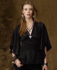 A lace-trimmed bodice lends ethereal grace to Denim & Supply Ralph Lauren's flowy boho-inspired top for otherworldly street style. A lace-trimmed bodice lends ethereal grace to Denim & Supply Ralph Lauren's flowy boho-inspired top for otherworldly street style.