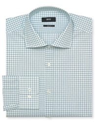 An easy-going check pattern adorns this superior cotton dress shirt, the perfect solution for when you have evening plans and need a shirt that works all day and night. An easy-going check pattern adorns this superior cotton dress shirt, the perfect solution for when you have evening plans and need a shirt that works all day and night.