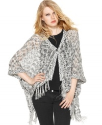 A relaxed poncho-style shape and fringe trim makes this Kensie sweater perfect for a summer boho look! A relaxed poncho-style shape and fringe trim makes this Kensie sweater perfect for a summer boho look!