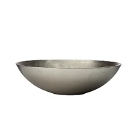 Organically molded under fire, this handmade bowl exudes metal artistry with a New York edge. Organically molded under fire, this handmade bowl exudes metal artistry with a New York edge.
