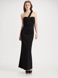 A long and elegant silhouette with a unique one-shoulder design, features an intricately seamed bust for a contoured fit.One shoulder strap Seamed and padded bust Side zip closure About 62 from shoulder to hem Fully lined 68% rayon/22% nylon/10% spandex Dry clean Made in USA of imported fabric A long and elegant silhouette with a unique one-shoulder design, features an intricately seamed bust for a contoured fit.One shoulder strap Seamed and padded bust Side zip closure About 62 from shoulder to hem Fully lined 68% rayon/22% nylon/10% spandex Dry clean Made in USA of imported fabric