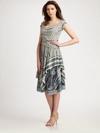Undeniably flattering, a pretty print, luxurious fabrication and a fashion-forward, asymmetrical hem come together as one. Round necklineCap sleevesSarong skirtAsymmetrical designAbout 25 from natural waistCotton; silk liningDry cleanMade in Italy Model shown is 5'9 (175cm) wearing US size Small. Undeniably flattering, a pretty print, luxurious fabrication and a fashion-forward, asymmetrical hem come together as one. Round necklineCap sleevesSarong skirtAsymmetrical designAbout 25 from natural waistCotton; silk liningDry cleanMade in Italy Model shown is 5'9 (175cm) wearing US size Small.