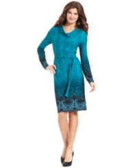 Jones New York Signature's paisley-print dress features a belt that ties at the waist and chic cowl neckline for an instantly sophisticated silhouette. Jones New York Signature's paisley-print dress features a belt that ties at the waist and chic cowl neckline for an instantly sophisticated silhouette.
