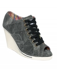 The best of worlds. Nine West's Telsa high wedge sneakers are rugged with a contrasting wedge heel. The best of worlds. Nine West's Telsa high wedge sneakers are rugged with a contrasting wedge heel.
