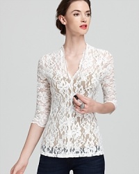Karen Kane's romantic lace top is essential for date night -- just add dark jeans and and perfect pair of pumps. Karen Kane's romantic lace top is essential for date night -- just add dark jeans and and perfect pair of pumps.