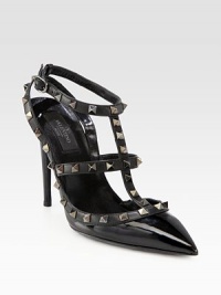 Signature metal studs enliven this lifted point toe silhouette in glossy patent leather. Self-covered heel, 4¼ (110mm)Patent leather upper with metal studsPoint toeAdjustable ankle strapLeather lining and solePadded insoleMade in Italy Signature metal studs enliven this lifted point toe silhouette in glossy patent leather. Self-covered heel, 4¼ (110mm)Patent leather upper with metal studsPoint toeAdjustable ankle strapLeather lining and solePadded insoleMade in Italy