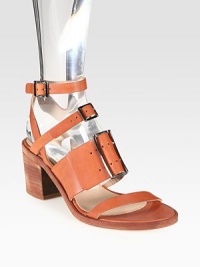 Elevated by a stacked heel, adjustable wrap-around straps give this ultra-smooth leather style a tailored feel. Stacked heel, 2½ (65mm)Leather upperLeather lining and solePadded insoleMade in Italy Elevated by a stacked heel, adjustable wrap-around straps give this ultra-smooth leather style a tailored feel. Stacked heel, 2½ (65mm)Leather upperLeather lining and solePadded insoleMade in Italy
