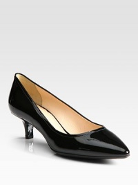 Patent leather pointed toe silhouette. Self-covered heel, 1¾(45mm)Patent leather upperLeather liningRubber solePadded insoleImportedOUR FIT MODEL RECOMMENDS ordering one half size up as this style runs small. Patent leather pointed toe silhouette. Self-covered heel, 1¾(45mm)Patent leather upperLeather liningRubber solePadded insoleImportedOUR FIT MODEL RECOMMENDS ordering one half size up as this style runs small.