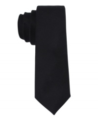 Make a singular statement with this sleek skinny tie from Calvin Klein. Make a singular statement with this sleek skinny tie from Calvin Klein.