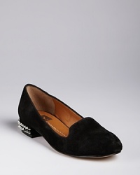 Chic, streamlined and of-the-moment smoking flats are set apart by brilliantly studded heels; by DV Dolce Vita. Chic, streamlined and of-the-moment smoking flats are set apart by brilliantly studded heels; by DV Dolce Vita.