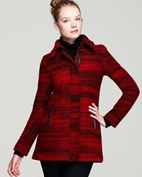 This red haute bouclé Mackage coat features variegated color, leather trim and a classically feminine silhouette to create a look that's truly modern. This red haute bouclé Mackage coat features variegated color, leather trim and a classically feminine silhouette to create a look that's truly modern.