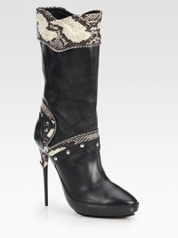 A piercing heel lifts this leather and snakeskin boot with edgy zipper trim, metal studs and a patent leather platform. Lacquered heel, 5¼ (130mm)Shaft, 10Leg circumference, 13½Leather and snakeskin upper with zipper trimPull-on styleLeather liningRubber solePadded insoleMade in Italy A piercing heel lifts this leather and snakeskin boot with edgy zipper trim, metal studs and a patent leather platform. Lacquered heel, 5¼ (130mm)Shaft, 10Leg circumference, 13½Leather and snakeskin upper with zipper trimPull-on styleLeather liningRubber solePadded insoleMade in Italy