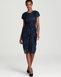 Encrusted in dazzling sequins, Tadashi Shoji Plus's brilliant dress lends a flattering fit with a gathered waist. Encrusted in dazzling sequins, Tadashi Shoji Plus's brilliant dress lends a flattering fit with a gathered waist.