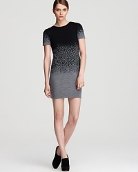 This Cut25 pullover sweater dress boasts a unique ombre pattern on a body-con silhouette for cozy chic. This Cut25 pullover sweater dress boasts a unique ombre pattern on a body-con silhouette for cozy chic.