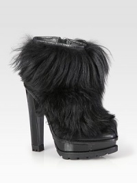This untamed silhouette achieves maximum impact with gleaming patent leather accents and genuine lamb hair. Patent leather heel, 5¾ (145mm)Patent leather platform, 1½ (40mm)Compares to a 4¼ heel (110mm)Leather and genuine lamb hair upperSide zipLeather liningRubber trek solePadded insoleImportedThis style runs true to size. We recommend ordering your usual size for a standard fit. This untamed silhouette achieves maximum impact with gleaming patent leather accents and genuine lamb hair. Patent leather heel, 5¾ (145mm)Patent leather platform, 1½ (40mm)Compares to a 4¼ heel (110mm)Leather and genuine lamb hair upperSide zipLeather liningRubber trek solePadded insoleImportedThis style runs true to size. We recommend ordering your usual size for a standard fit.