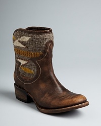 Rope in these FREEBIRD by Steven Western booties with one-of-a-kind style. Rustic, broken-in leather and antique-look blanket details give them a vintage look that will wear well for years. Rope in these FREEBIRD by Steven Western booties with one-of-a-kind style. Rustic, broken-in leather and antique-look blanket details give them a vintage look that will wear well for years.