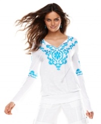 The beauty's in the beading! INC's dramatically embroidered and bejeweled tunic adds exotic flair to any outfit.