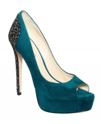 A sparkling surprise. Boutique 9's Carey platform pumps are made of smooth suede up front while the heel is covered in the coolest crushed glitter. A sparkling surprise. Boutique 9's Carey platform pumps are made of smooth suede up front while the heel is covered in the coolest crushed glitter.