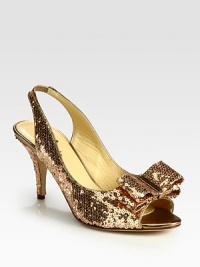 Backed by a stretchy slingback, this sequin-encrusted leather essential has metallic leather trim and a darling bow embellishment. Self-covered heel, 3 (75mm)Sequin-coated leather and metallic leather upperLeather lining and solePadded insoleImportedOUR FIT MODEL RECOMMENDS ordering one half size up as this style runs small. Backed by a stretchy slingback, this sequin-encrusted leather essential has metallic leather trim and a darling bow embellishment. Self-covered heel, 3 (75mm)Sequin-coated leather and metallic leather upperLeather lining and solePadded insoleImportedOUR FIT MODEL RECOMMENDS ordering one half size up as this style runs small.
