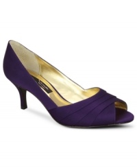 The Nina Criana Evening Pumps keep you dancing all night with their pleated satin upper, peep toe and darling kitten heel. The Nina Criana Evening Pumps keep you dancing all night with their pleated satin upper, peep toe and darling kitten heel.