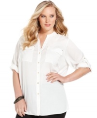 Calvin Klein's roll-tab sleeve plus size top is a versatile piece for your day-to-play wardrobe-- dress it up with trousers or down with denim. Calvin Klein's roll-tab sleeve plus size top is a versatile piece for your day-to-play wardrobe-- dress it up with trousers or down with denim.