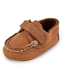 A comfy starter deck shoe from Ralph Lauren. Moc toe with heavy topstitching and easy on/off strap closure at the ankle. A comfy starter deck shoe from Ralph Lauren. Moc toe with heavy topstitching and easy on/off strap closure at the ankle.