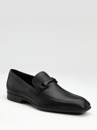 A clean and classic leather design is finished with a tonal gancini ornament and rubber soles for all-day ease. Leather lining Padded insole Rubber sole Made in Italy A clean and classic leather design is finished with a tonal gancini ornament and rubber soles for all-day ease. Leather lining Padded insole Rubber sole Made in Italy