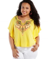 Vibrant, tribal-inspired embroidery at the neckline makes this plus size top a fun companion to your favorite jeans! From ING. Vibrant, tribal-inspired embroidery at the neckline makes this plus size top a fun companion to your favorite jeans! From ING.