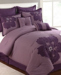 Modern romance blooms. Passionate purple sets the scene in this Fatima comforter set, featuring bold applique flowers in tonal hues. Comes complete with shams, bedskirt and decorative pillows for a look that's simple yet totally chic. Modern romance blooms. Passionate purple sets the scene in this Fatima comforter set, featuring bold applique flowers in tonal hues. Comes complete with shams, bedskirt and decorative pillows for a look that's simple yet totally chic.