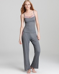 With pretty lace details and bow accents, Honeydew's ribbed camisole and pants are a sweet set for sleep. With pretty lace details and bow accents, Honeydew's ribbed camisole and pants are a sweet set for sleep.