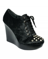 Let 'em look, darling. Between the pony hair upper, the silver studded toe and the mega wedge heel, Kensie's Pretty Girl booties are sure to turn heads. Let 'em look, darling. Between the pony hair upper, the silver studded toe and the mega wedge heel, Kensie's Pretty Girl booties are sure to turn heads.