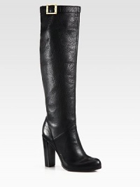 A sexy heel lifts this pebbled leather silhouette, topped with a gleaming goldtone buckle strap. Stacked heel, 4½ (115mm)Stacked platform, ½ (15mm)Compares to a 4 heel (100mm)Shaft, 18Leg circumference, 14½Leather upperPull-on style with buckle strapLeather lining and solePadded insoleImported A sexy heel lifts this pebbled leather silhouette, topped with a gleaming goldtone buckle strap. Stacked heel, 4½ (115mm)Stacked platform, ½ (15mm)Compares to a 4 heel (100mm)Shaft, 18Leg circumference, 14½Leather upperPull-on style with buckle strapLeather lining and solePadded insoleImported