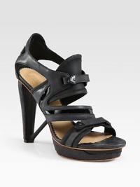 Grounded by an architectural heel, this leather confection has an island platform, Velcro® straps and patent leather trim. Straw heel, 5 (125mm)Island platform, 1 (25mm)Compares to a 4 heel (100mm)Leather and patent leather upperLeather lining and solePadded insoleImportedOUR FIT MODEL RECOMMENDS ordering true whole size; ½ sizes should order the next whole size up. Grounded by an architectural heel, this leather confection has an island platform, Velcro® straps and patent leather trim. Straw heel, 5 (125mm)Island platform, 1 (25mm)Compares to a 4 heel (100mm)Leather and patent leather upperLeather lining and solePadded insoleImportedOUR FIT MODEL RECOMMENDS ordering true whole size; ½ sizes should order the next whole size up.