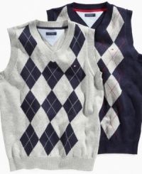 This classic Tommy Hilfiger argyle sweater vest is a must have for back-to-school. This classic Tommy Hilfiger argyle sweater vest is a must have for back-to-school.