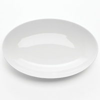 Fine porcelain dinnerware, serveware and accessory pieces made in Germany designed by Thomas for Rosenthal. White color with subtle raised white lines. Perfect for everyday use or entertaining. Dishwasher and microwave safe.