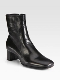 Leather block heel design with square toe and side zip. Self-covered heel, 1¾ (45mm)Leather upperSide zipperLeather lining and rubber solePadded insoleImported Leather block heel design with square toe and side zip. Self-covered heel, 1¾ (45mm)Leather upperSide zipperLeather lining and rubber solePadded insoleImported