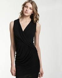 Intricate ruching and artful draping create an effortlessly elegant silhouette for this Velvet by Graham & Spencer dress. Intricate ruching and artful draping create an effortlessly elegant silhouette for this Velvet by Graham & Spencer dress.